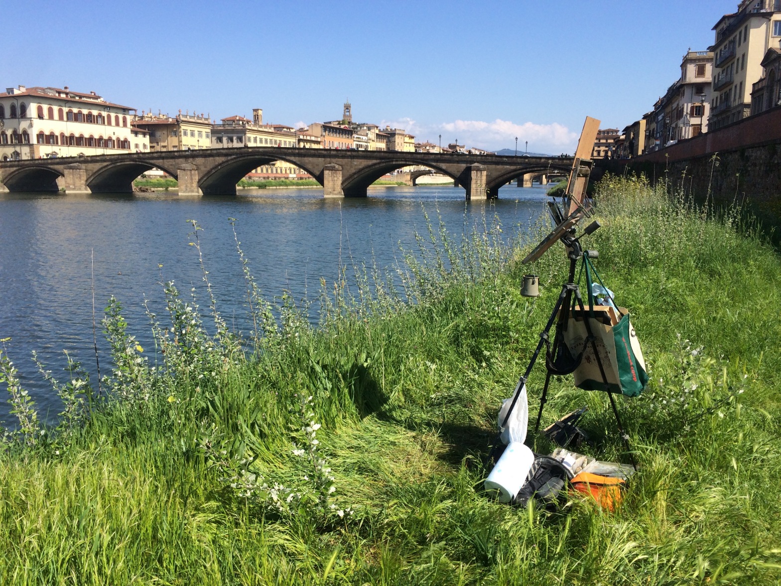 Plein air painting setup on the Arno River in Florence.